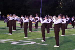 Padua Franciscan High School marching band performing during a football game