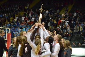 Padua Franciscan High School women's volleyball team hoisting the state trophy in Ohio