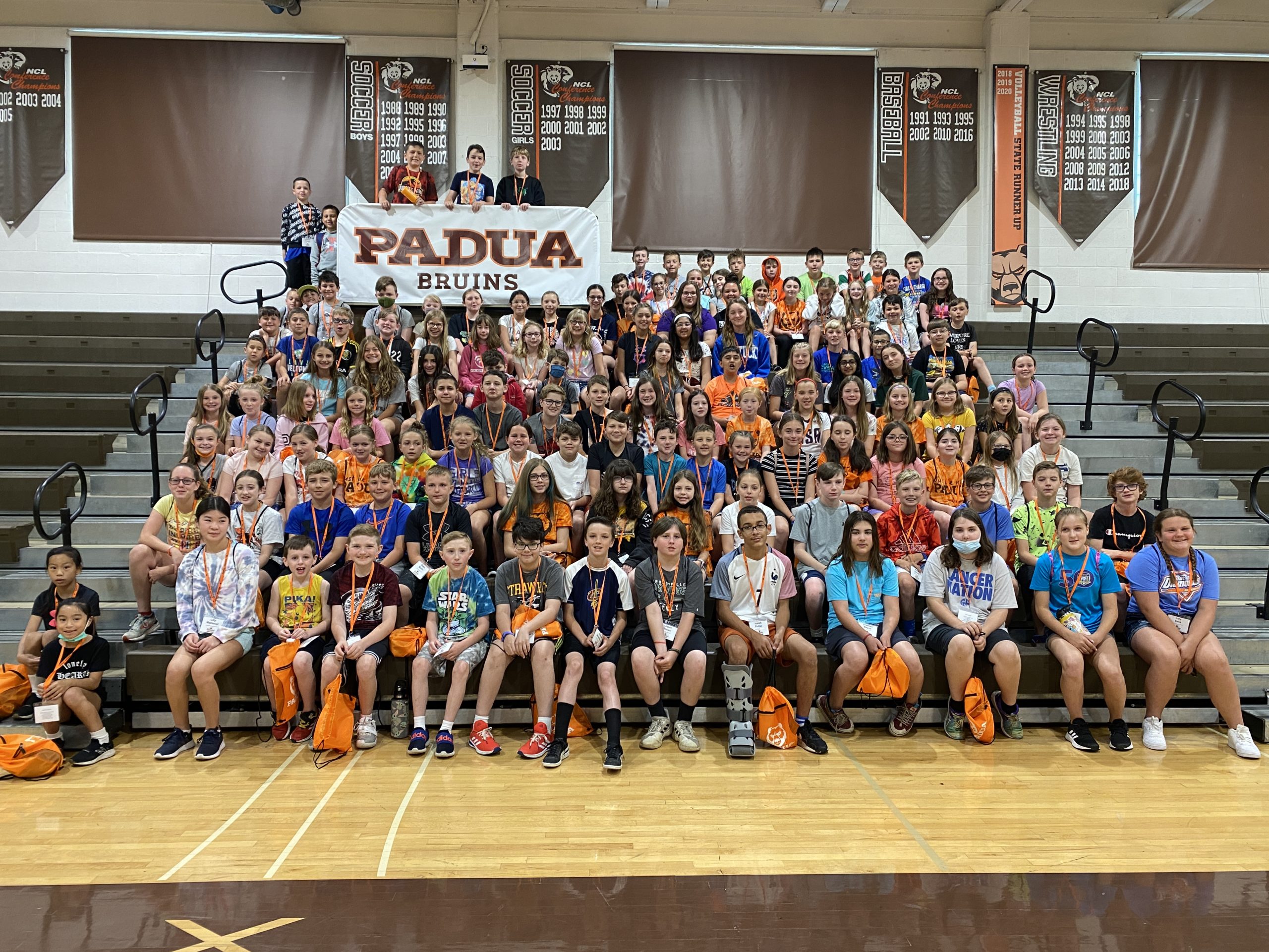 Group photo of Padua Franciscan students in the gym